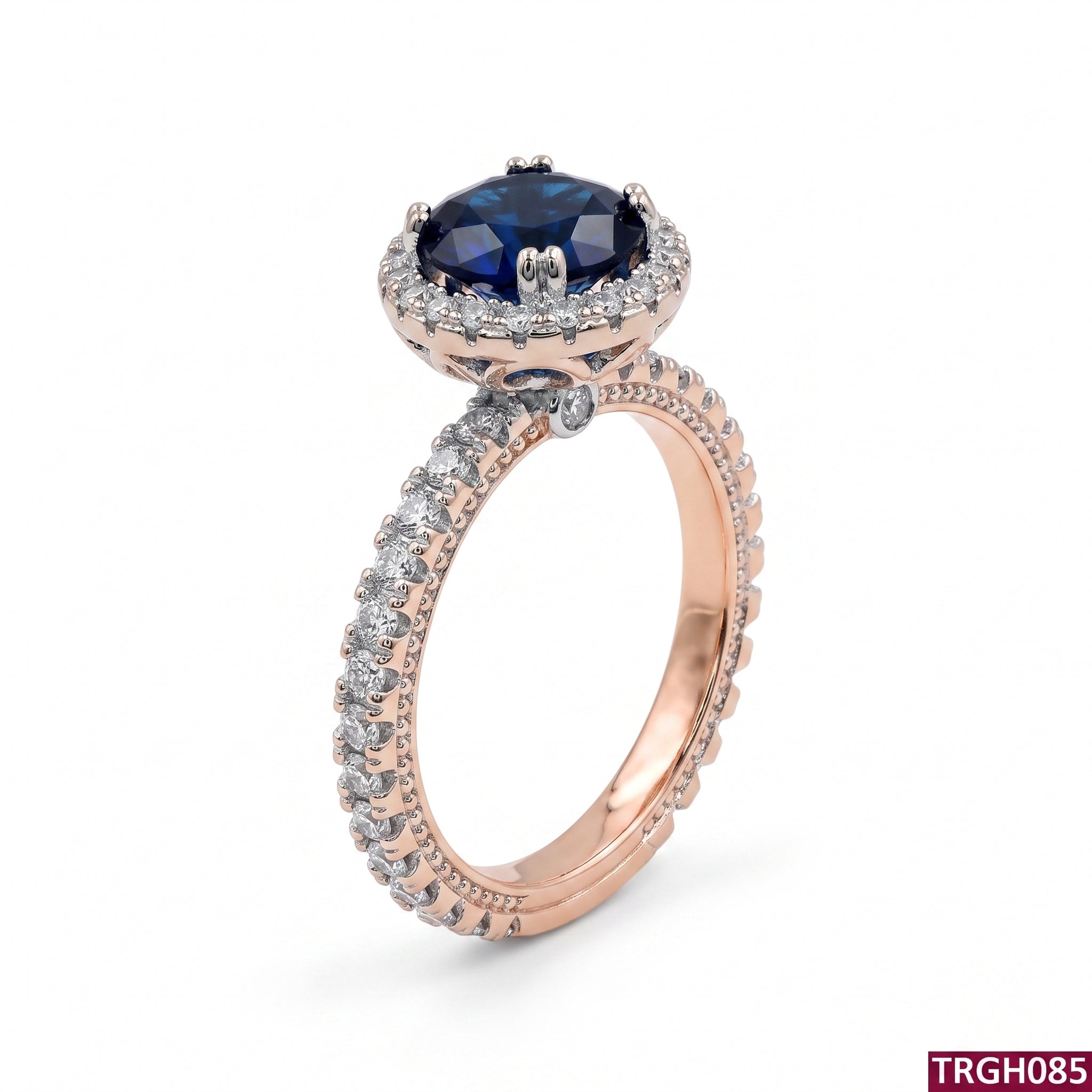 Oval Cut Dark Blue Sapphire Halo Engagement Ring in Rose Gold | Style