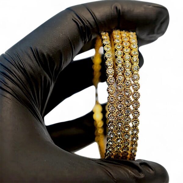 Gold Plated Crystal Bangle — Shandaar Jewellers Gold plated bangle with crystals on white background – Shandaar Jewellers Pakistan