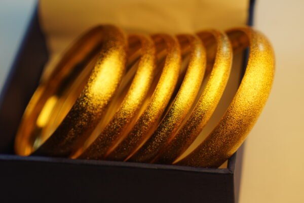 DSC09900 Elegant gold-plated textured bangle set for women